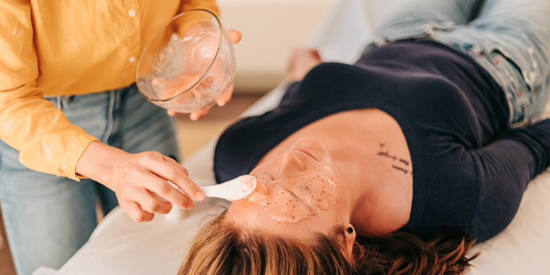 Patient relaxing while Goji Antioxidant Hydrojelly Mask is applied at the end of the Acupuncture Glow Facial at Seneca Falls Acupuncture.