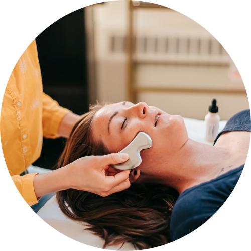 Patient relaxing deeply while getting the Cosmetic Acupuncture Glow Facial at Seneca Falls Acupuncture, near Geneva, Auburn, Waterloo, Skaneateles, and Union Springs, New York.